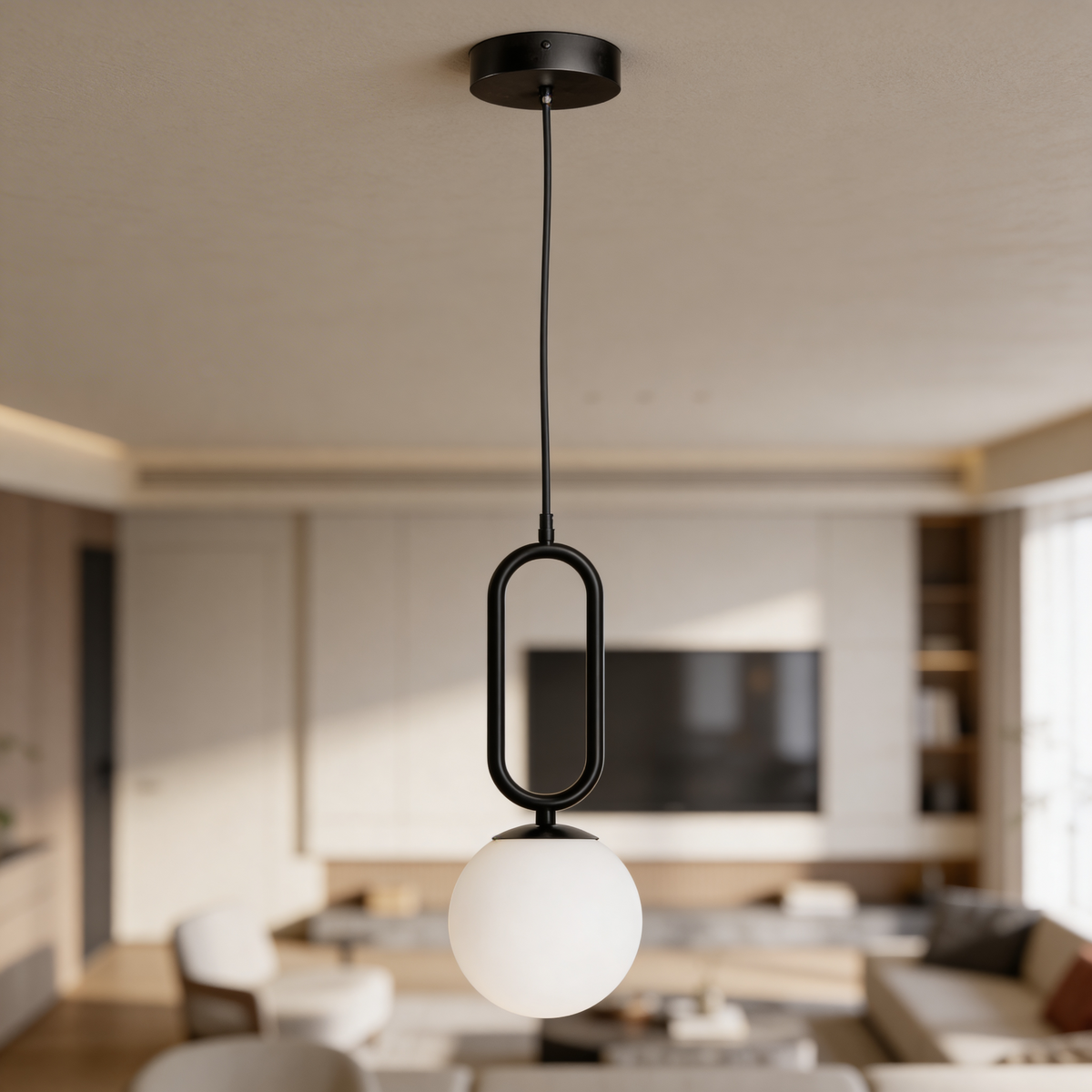 Lampa Obal wisząca z kulistym kloszem i czarną ramą w stylu loftowym – w aranżacji wnętrza